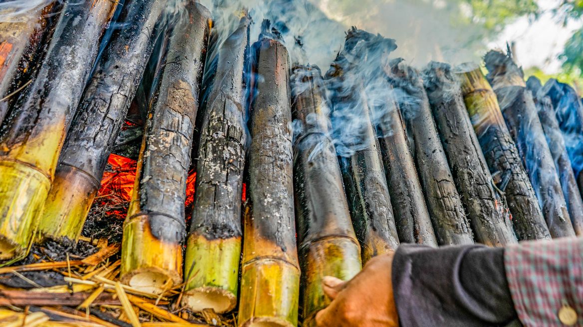Visit the local bamboo sticky rice cake cooking 