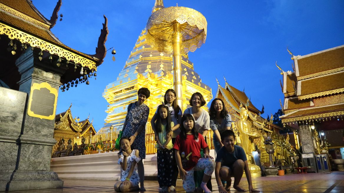 golden Doi sutep temple after sunset