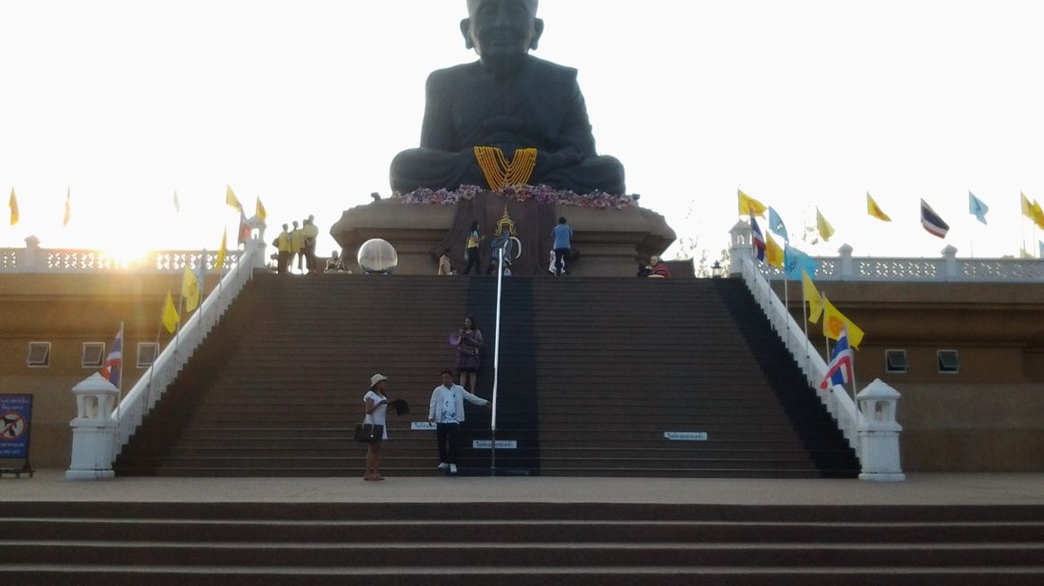 Pay respect at Huay Mongkol Temple