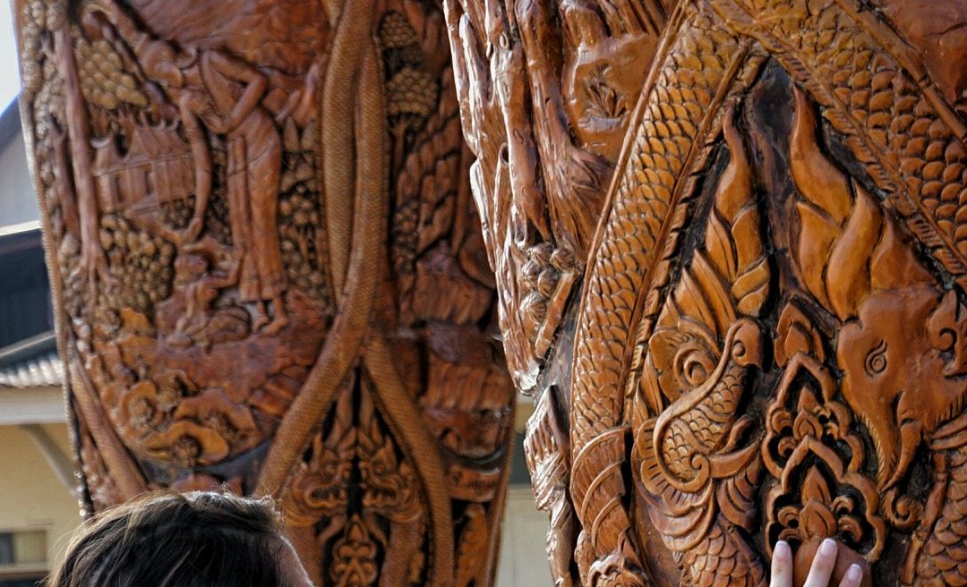 teak wood carved by local