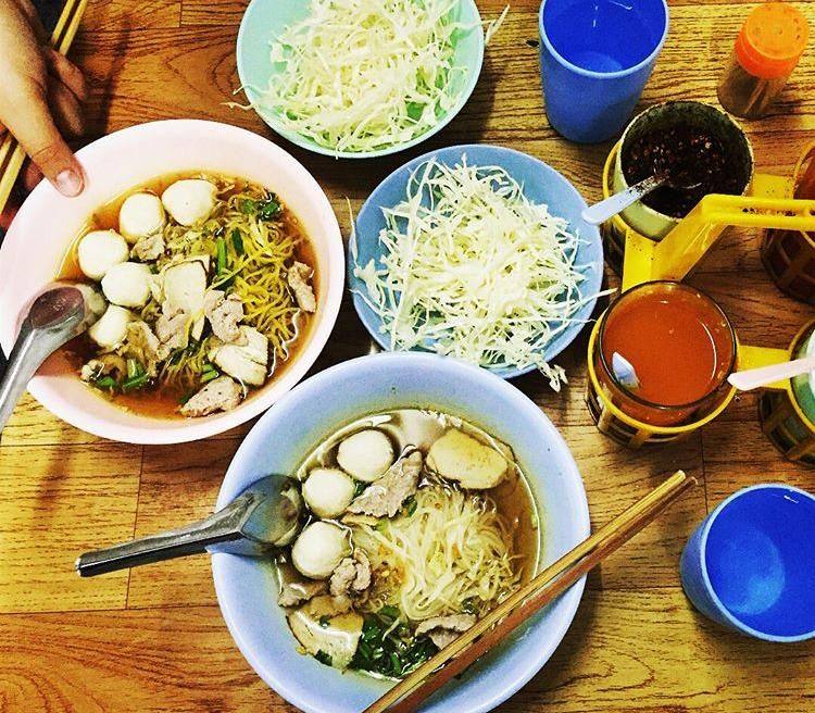 Yummy pork noodles  ; The old pork noodles restaurant in Warorot market. Special recipes are Soup of marinate pork and home made meatball.