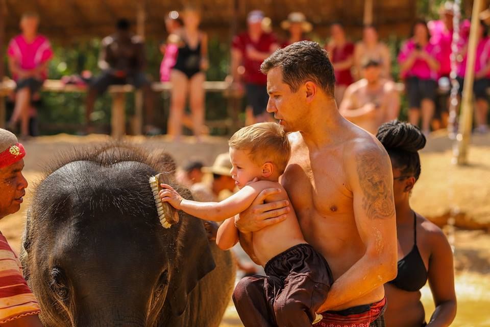 We take bath with elephants in the pool.