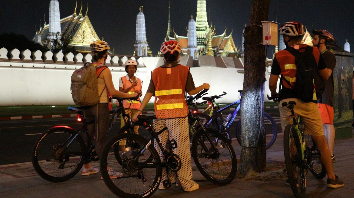See sights like the Royal Grand Palace lit up at night