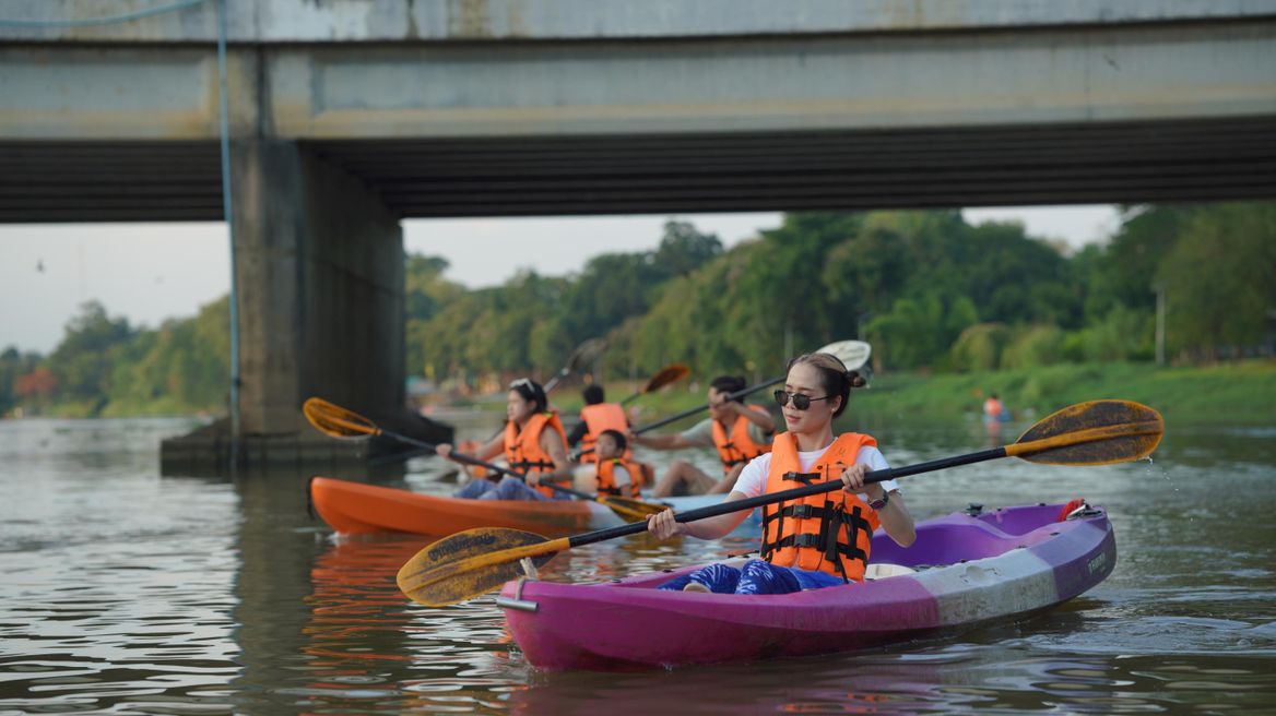 Explore the local community kayaking