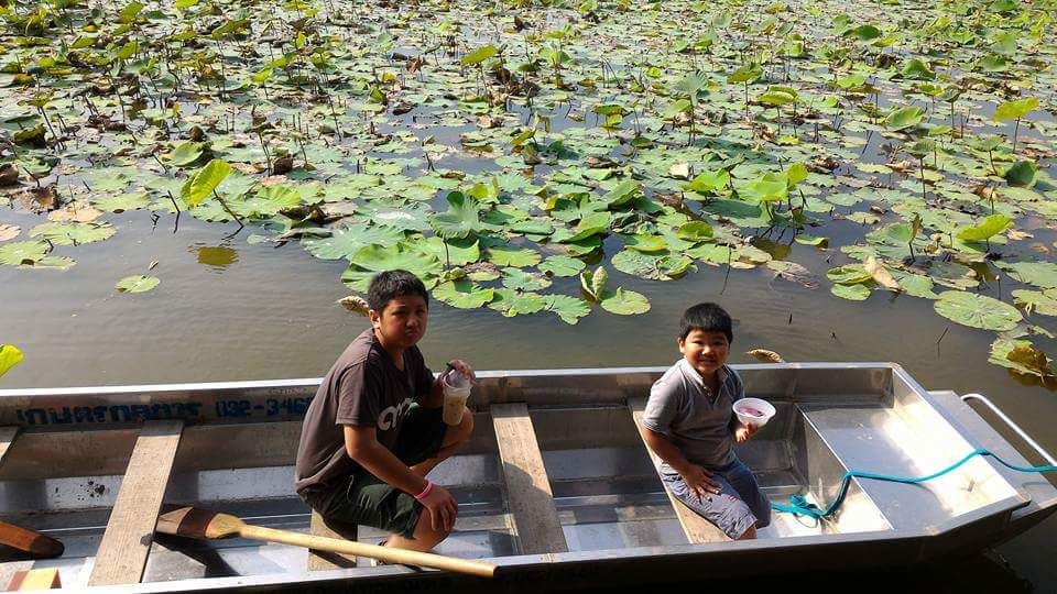 On board this little paddle boat. 