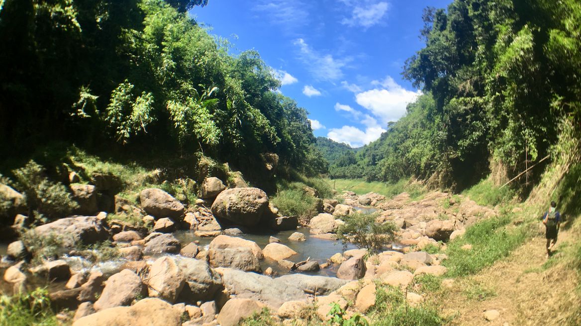 Walking through beautiful preserved nature inside the dam to witness the waterfalls 
