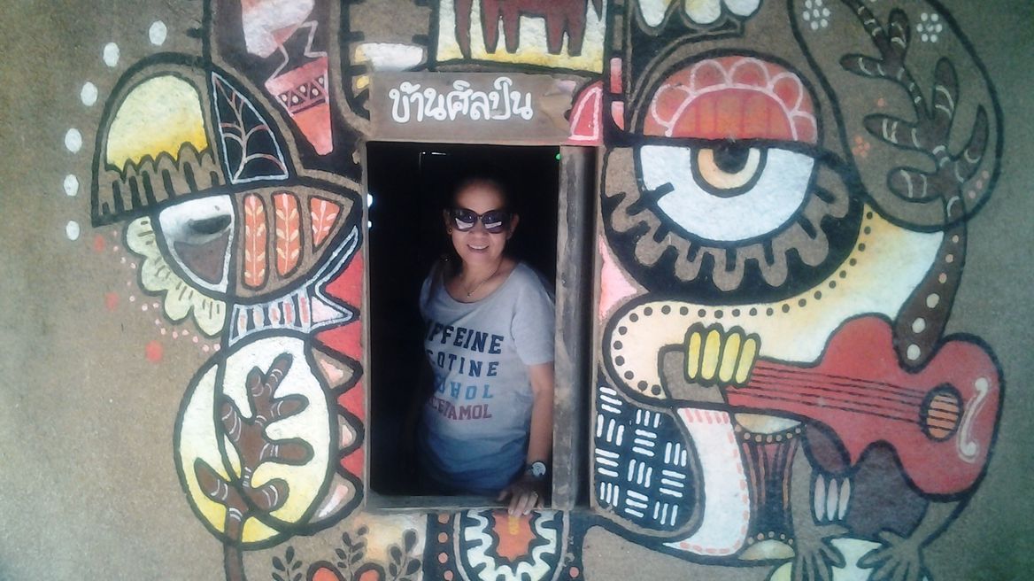 Grab a cool pic at Artist Village 