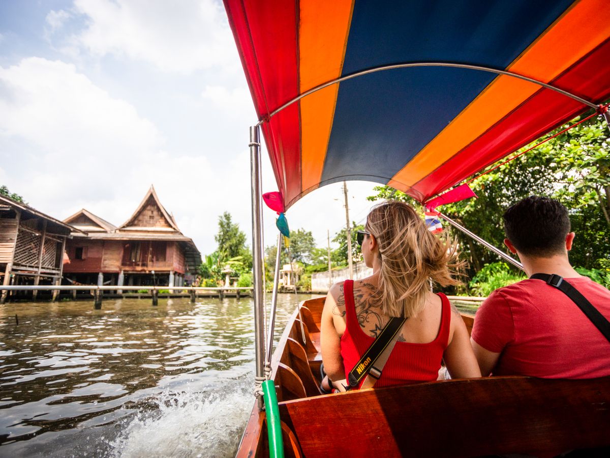 Women traveling in the boat in Bangkok Thailand