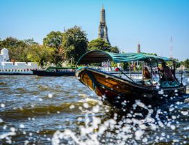 Boat ride along the river to visit temple and relax with massage